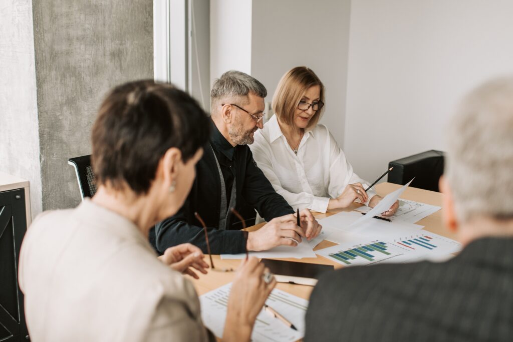 People in the middle of a meeting.